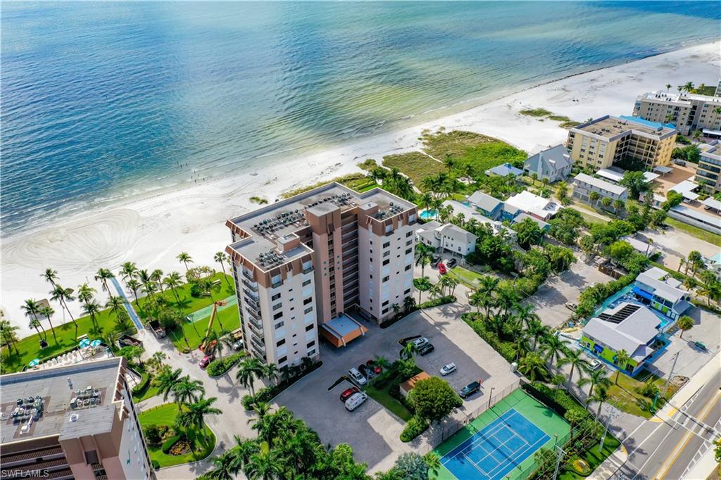 Todays forecast: Live In Paradise. The owner would consider a property exchange. Enjoy living in one of the most desirable condos on Fort Myers Beach. Caper Beach Club offers amenities that include Gulf front living on the white sand of Fort Myers Beach with a Clubhouse, resort style pool and deck, tennis court, shuffleboard and lush landscaping. This 4th floor unit is located in the preferred building #1 and offers 2 bedrooms and murphy beds in the dinning area for the extra guest with 2 baths. This unit has close to $200,000 in remodels and furnishings. Caper Beach Club has on-site association run management with a great optional rental program. Please view the video and pictures for a tour of your new home or vacation property with a large income.  BE SURE TO CHECK OUT THE VIRTUAL TOUR FOR THIS PROPERTY!
