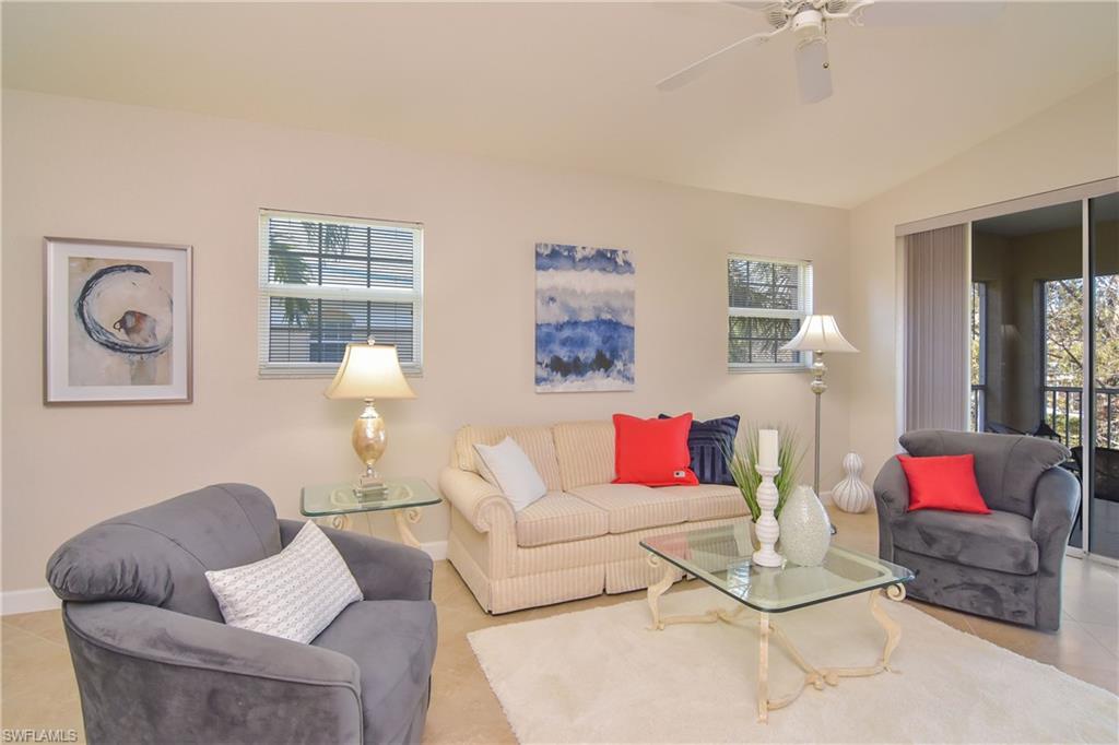 PEACEFUL 2 plus Den AND formal dining END Unit in popular Calusa Bay!  The BRAND NEW ROOF is a huge plus and soon the community pool area will have a new screen enclosure (and a new roof). One of the most desirable floor plans flows seamlessly with 3 exposures north, south and west.  Lovely lake and water feature view, open yet private. A touch of Nantucket echoed in Master bath double sink vanity, clean coastal lines carried to the kitchen with designer lighting, granite, stainless steel appliances and more in this renovated carriage home with detached garage.  Beautiful porcelain tile throughout main living areas with quality carpet on stairway and in bedrooms. Abundant amenities offer a resort lifestyle in this treasured community. Whether full time or part time you'll love the convenient proximity to the Gulf of Mexico and the white sandy beaches here in Naples, the vast array of shopping and dining such as Mercato with the convenience of Whole Foods, wonderful eateries, and entertainment, Vanderbilt Galleria or Waterside Shops.
