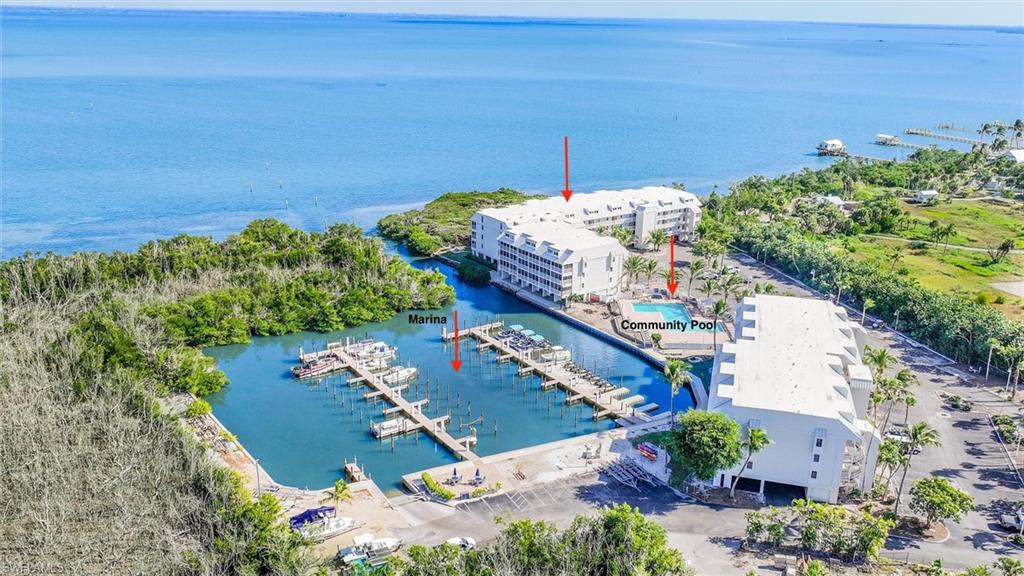 Just renovated Bayside Villa located in the gated private South Seas Resort. New kitchen and bathrooms to include granite countertops, shaker cabinets, new flooring, gorgeous walk-in shower all set in a soothing sea salt palette. Wake up to sunrise over Pine Island Sound. The Bayside amenities include an oversized sun-drenched pool and spa, under building parking, on site laundry, pool baths, marina side grills and picnic areas. No rental commitments so all options open. Move in and enjoy or place your property in a rental program. Just footsteps to the beach for a dip in the Gulf of Mexico. Easy access to village of Captiva's shops, restaurants, boating and water sports. Enjoy South Seas world class amenities with membership. Immerse yourself in the luxury of this stunning property.  This exclusive opportunity enhances your living experience, offering a range of premium amenities and services tailored for members and guests. With this exceptional membership, enjoy unparalleled access to facilities that elevate your lifestyle.