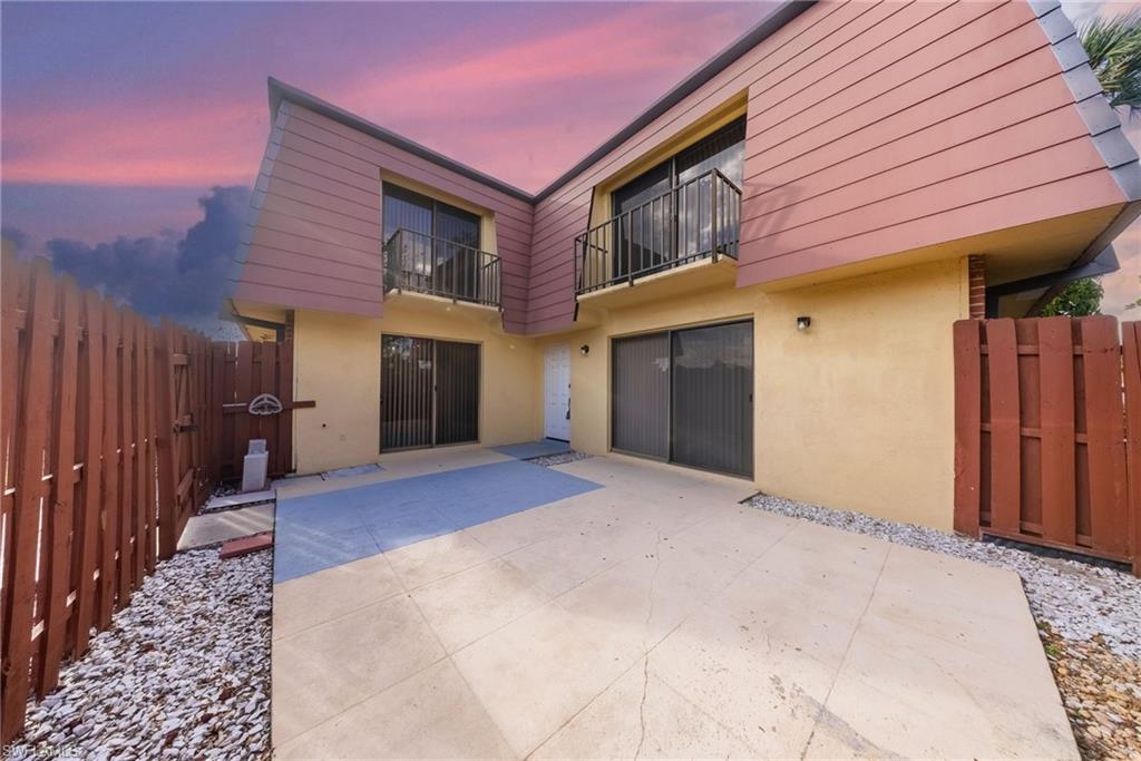 Enjoy low-maintenance Florida living in this beautifully updated townhouse featuring a newer roof and HVAC system for added peace of mind, all within a community with a low HOA fee. The upgraded kitchen is equipped with newer stainless steel appliances, including a refrigerator, range, dishwasher, and garbage disposal, while a full-size washer and dryer are included for your convenience.

The interior features tile flooring throughout both the first and second floors, offering a clean, cohesive look with easy maintenance. Sliding glass doors from both the kitchen and living room open to a private fenced courtyard, creating the perfect space for grilling, relaxing outdoors, or entertaining family and friends.

Located just steps from the community pool, this home also includes assigned parking for two vehicles. As an added bonus, the sale includes two brand-new twin beds and one king-size bed, making it move-in ready.

Ideally situated in the heart of Southwest Florida, you'll enjoy easy access to shopping, dining, entertainment, RSW International Airport, beautiful Gulf beaches, and everything you need to embrace the Florida lifestyle.

Whether you're searching for a full-time residence, seasonal retreat, or investment opportunity, this centrally located home places you just minutes from everything Southwest Florida has to offer.