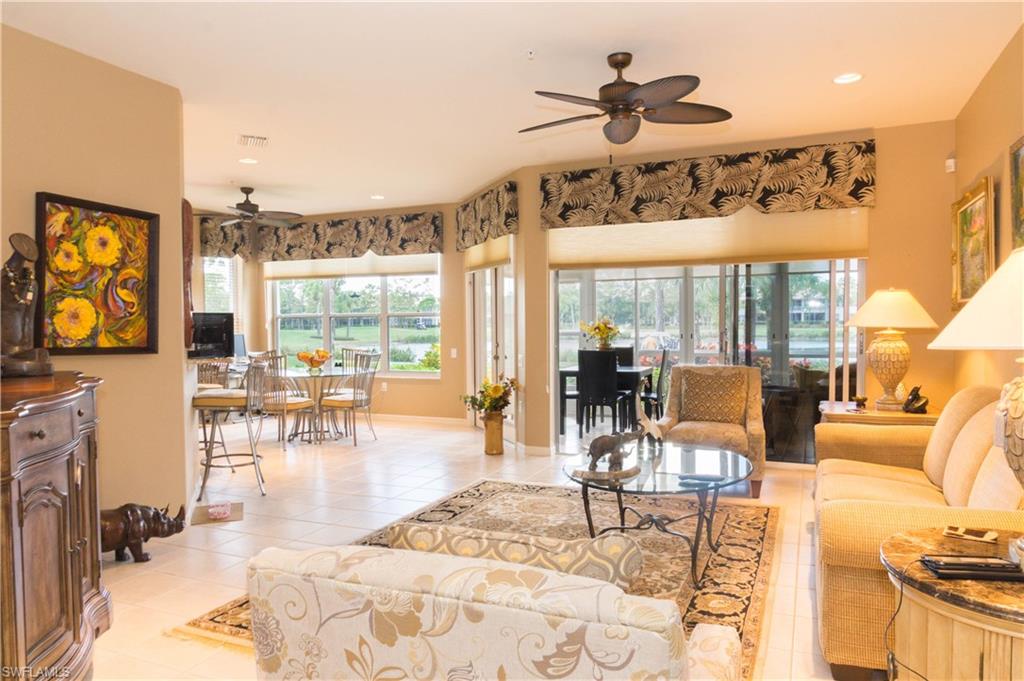 This First Floor End Unit OXFORD Model is one of the most popular Carriage Homes in Vanderbilt, and features a fully enclosed lanai.  Screened entry way.  New A/C Compressor in 2014.  Plantation shutters in bedrooms and den.  The kitchen includes upgraded beveled granite counter tops, upgraded cupboards with pull out metal shelving and self closing drawers.  New carpeting installed in both bedrooms and den in 2014.  Master Bedroom has walk in California closet. Master bath has dual sink vanity, upgraded cabinets, tub with jets and water closet  Guest bath has upgraded shower, upgraded cabinets with new faucet and framed mirror.  The enclosed lanai faces the north and over-looks the 16th tee box and 17th fairway of the golf course.  Vanderbilt Country Club has a beautifully remodeled and expanded club house, a new health and fitness center and the new Terrace Cafe for informal dining overlooking the community pool and tennis courts.  The newly designed and renovated golf course re-opened in November 2015 to the delight of the membership.  Vanderbilt is a bundled golf and tennis community with a strong financial position and is an active social community.
