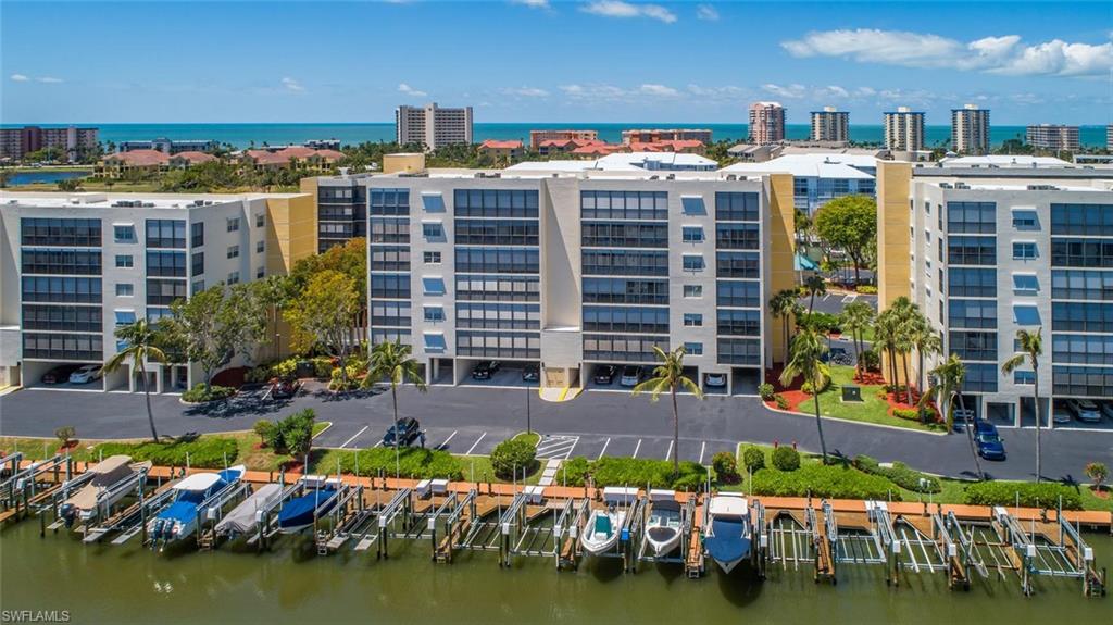 "HIBISCUS POINT" PRIVATE BEACH ACCESS - BOATING- FISHING-COMMUNITY! SPECTACULAR AND A "BEST BEACH VALUE" PROPERTY! COMES "TURN KEY" 2 BEDROOM, 2 BATH, 3RD FLOOR CONDO W/ OVER $60,000 IN RECENT RENOVATIONS INCLUDING BRAND NEW (2019) A/C WITH 10 YEAR WARRANTY. ALL PORCELAIN TILE FLOORS & CROWN MOLDING THROUGHOUT ENTIRE HOME. NEW GOURMET KITCHEN W/ NEWER CABINETS & GRANITE TOPS, PASS-THRU GRANITE BAR FOR ENTERTAINING CONVENIENCE. ALL BATHROOMS COMPLETELY RENOVATED. LARGE MASTER BEDROOM W/ EXTRA LARGE WALK-IN CLOSET. HUGE 24' SCREENED BALCONY RUNS THE ENTIRE LENGTH OF CONDO W/ VIEWS DIRECTLY OVER CHANEL & MARINA. ALL WINDOWS COVERED BY STORM SHUTTERS & BALCONY HAS ELECTRIC SHUTTERS STORM PROTECTION. LIBERAL RENTAL POLICY & ALREADY BOOKED RESERVATIONS FOR NEXT SEASON (IF BUYER WANTS INCOME OF $12.000)! BOAT DOCKS ALSO AVAILABLE TO LEASE OR BUY, SO BRING YOUR BOAT! THIS IS A PREMIER "BEST BEACH VALUE" WATERFRONT BUY! PROPERTY COMES WITH ONE YEAR HOME SERVICE WARRANTY FOR TOTAL BUYER COMFORT.