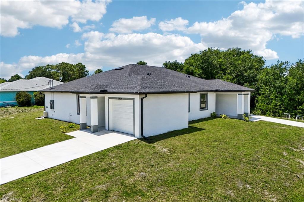 SELLER IS OFFERING INCENTIVES TOWARDS DOWNPAYMENT OR CLOSING COSTS. Positioned on a prime corner lot close to a desirable area of Lehigh Acres, this newly constructed duplex WITH TWO ATTACHED GARAGE SPACES presents a compelling opportunity for investors seeking both immediate income and long-term upside. The corner lot property with private entrances on seperate streets is intentionally designed to attract quality tenants and deliver consistent performance.
Each residence features 3 bedrooms and 2 bathrooms, offering a layout that comfortably accommodates families, professionals, or those needing additional space to live and work. A standout feature is the corner configuration, with each unit enjoying its own private entrance on separate streets, creating a sense of independence and privacy that sets this property apart in the rental market. Each unit also includes a 1-car attached garage with epoxy floor, adding both convenience and value for tenants.
The interior is highlighted by 10-foot ceilings, 8-foot interior doors, quartz countertops, premium appliances, and open-concept living spaces designed for both functionality and everyday comfort. The construction emphasizes durability and efficiency, helping to minimize maintenance and protect long-term returns.
The location further strengthens the investment. Ideally positioned in Lehigh Acres with quick access to Fort Myers, this duplex is just minutes from the rapidly expanding corridor at SR 82 and Daniels Parkway, one of the area’s most exciting growth hubs. The upcoming Gateway Marketplace, anchored by Publix and Home Depot and slated for completion in 2027, along with the nearby Timber Creek community, is set to bring a surge of new retail, dining, and residential activity. Ongoing road improvements, including the widening of Daniels Parkway, further enhance accessibility and long-term value, making this an attractive opportunity in a high-growth location.
Whether you’re adding to an existing portfolio or entering the investment space, this duplex offers a balanced combination of stability, desirability, and long-term potential.