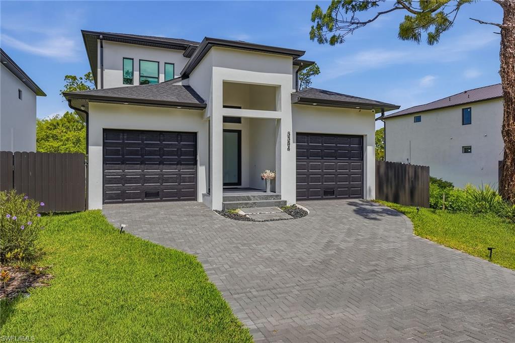 Experience Naples waterfront living in this newly built canal-front residence offering direct Gulf access and an ideal location just minutes from downtown Naples, Fifth Avenue South, dining, luxury shopping and the area’s white sand beaches. Designed with a modern coastal aesthetic and effortless indoor-outdoor flow, the home features finishes, a screened lanai, a pool and a fenced backyard, creating the perfect environment for entertaining and everyday living. With no HOA fees and established rental income potential, the property also presents an outstanding investment opportunity. This designed floor plan includes four bedrooms, three full baths, one half bath and a two-car garage. Impact-resistant doors and windows provide security and peace of mind, while the covered outdoor living spaces offer comfortable seating areas overlooking the pool and patio. Inside, elegant tile flooring runs throughout the home, complemented by abundant natural light and remote-controlled shades. The spacious main living area is highlighted by soaring vaulted ceilings that create a bright and inviting atmosphere for casual living and entertaining. Offered furnished with imported Italian furnishings, the residence showcases designer style throughout. Adjacent to the main living area, the dining space opens directly to the lanai through sliding glass doors, enhancing the seamless indoor-outdoor lifestyle. The gourmet kitchen is appointed with recessed lighting, custom cabinetry, an oversized waterfall-edge quartz island with seating and premium appliances, including a Wolf 36-inch electric range, microwave, dishwasher and refrigerator/freezer with icemaker. A convenient pot filler adds style and functionality to the space. The home is also equipped with two laundry stations, including one washer and dryer set located upstairs and an additional washer and dryer downstairs along with a laundry tub. The first-floor primary suite serves as a luxurious private retreat featuring tile flooring, a ceiling fan, abundant natural light and sliding glass doors providing direct access to the lanai. The spa-inspired en-suite bath includes dual vanities, an enclosed water closet, an oversized custom walk-in closet and a large glass walk-in shower with multiple shower heads. Upstairs, a versatile loft with recessed lighting offers additional living space ideal for a media room, office or lounge. One guest suite features a ceiling fan, natural light, a custom walk-in closet and a private en-suite bath with a glass walk-in shower and multiple shower heads. Two additional guest bedrooms include ceiling fans, generous closet space and natural light, while the upstairs hall bath is finished with a glass walk-in shower with multiple shower heads. Blending contemporary luxury with an unbeatable boating location, this exceptional waterfront residence offers the ultimate Naples lifestyle with direct Gulf access and close proximity to the city’s desirable attractions.