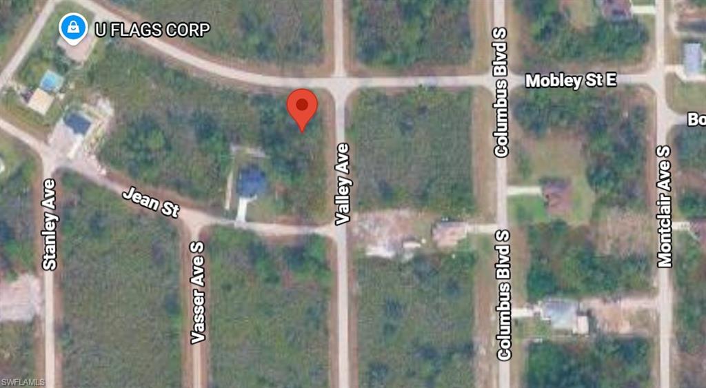 Oversized 0.34-acre corner lot located in the growing community of Lehigh Acres. This spacious property offers excellent potential for a custom home or investment opportunity. Conveniently situated in an area experiencing continued residential growth and new construction, this lot provides added flexibility and curb appeal thanks to its desirable corner location. Don't miss the opportunity to own a larger-than-average homesite in one of Southwest Florida's expanding markets. Bring your offer today!