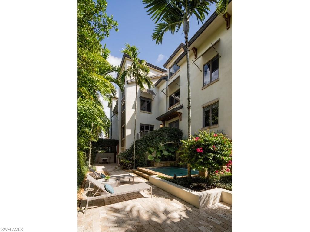 A romantic setting in Old Naples located just blocks from the sugar sand beaches and in close proximity to both the city’s Fifth Avenue South and Third Street South cultural districts, which include world class dining, theater, and shopping opportunities. Guests are greeted by the private and lushly landscaped courtyard, featuring a plunge pool, outdoor grill area, and exciting outdoor entertaining space. Just one of four units in an intimate, small complex, this beautifully decorated condominium lives like a single-family residence featuring three generously sized bedrooms with ensuite bathrooms, a study, expansive kitchen/dining areas, large great room, private elevator, highly sought after storage rooms, and two car garage. This fastidiously maintained residence together with one of the most exhilarating locations in town, make this a rare opportunity to enjoy the best Naples has to offer.