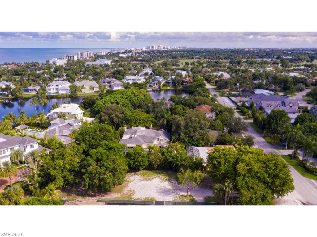 Extraordinarily large building envelope! Rhodes & Rhodes survey indicates the property to be approximately .5 acres, an incredibly rare offering in Old Naples. A unique opportunity in Old Naples to build a sizable home all on one level or a myriad of other possibilities. Located in close proximity to the beaches and the excitement of downtown Old Naples.