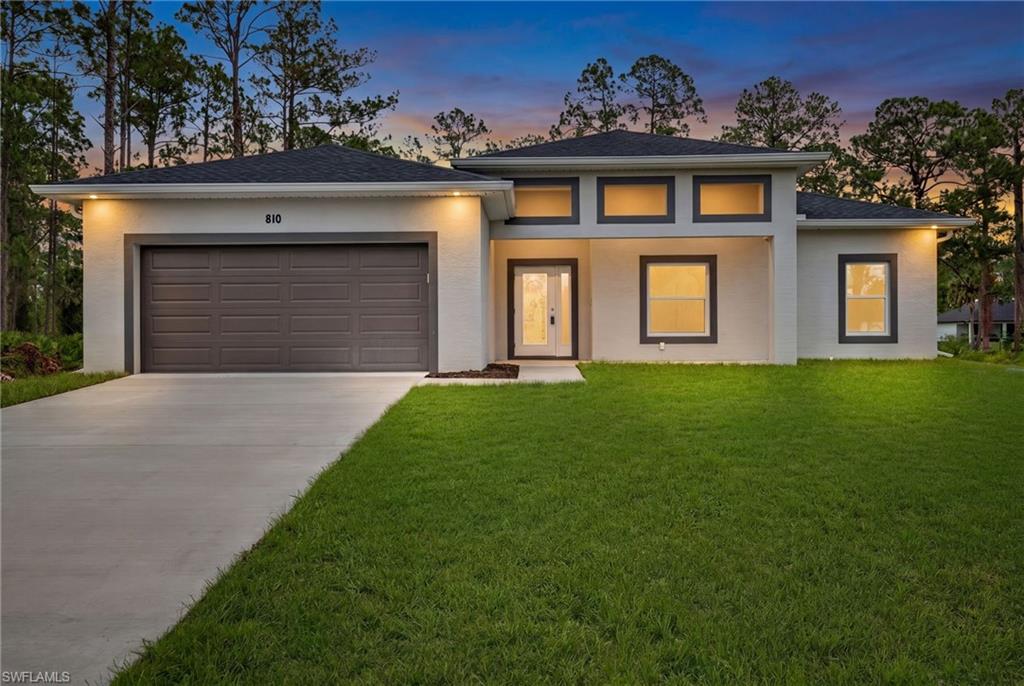 New construction ready for its new owners, thoughtfully designed to be perfect for any family. This spacious, modern home sits on a half-acre lot, offering plenty of room for a pool and extra toys. Features include three bedrooms plus a den or office. With the certificate of occupancy in hand, you can move right in. Located in a beloved area of Lehigh Acres, surrounded by abundant new builds. Don't let this one get away. Call for your private showing today.