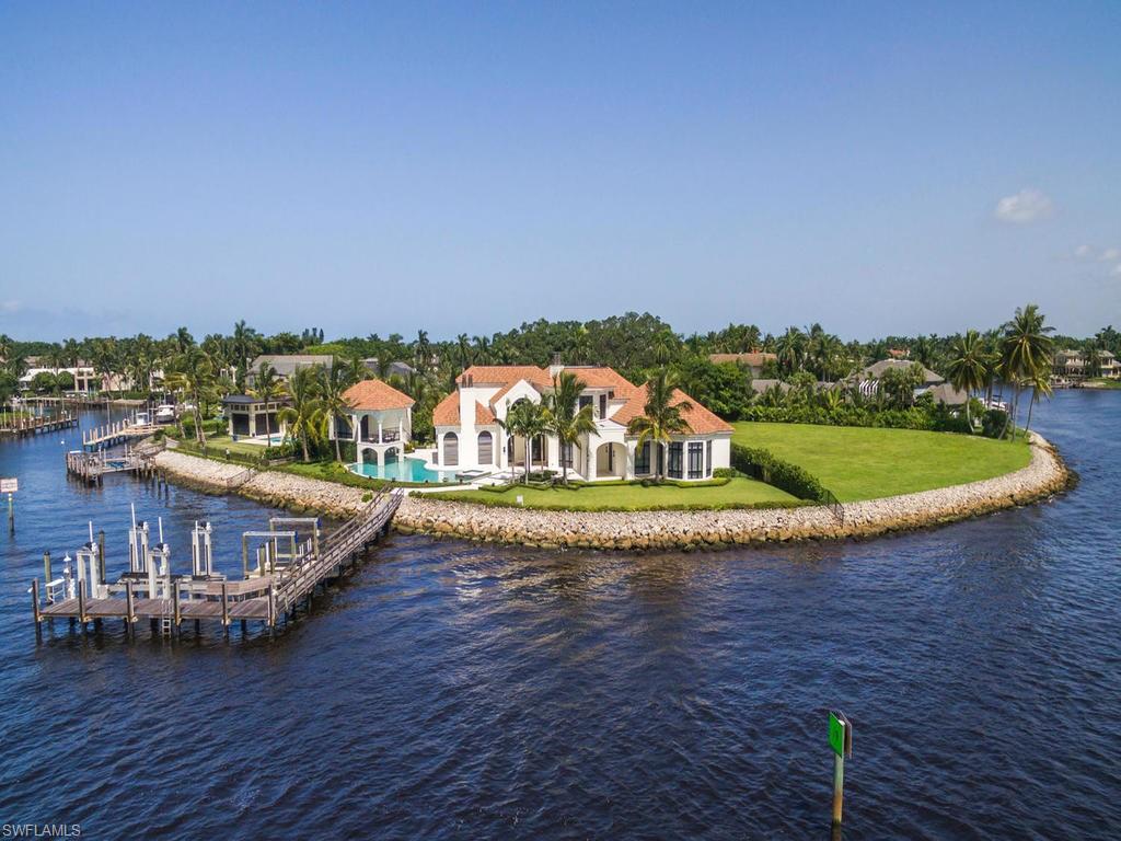 This home is boasting the most idyllic setting in all of Port Royal with unobstructed, wide-water, views and preferred southern exposure. With classic Palm Beach infused architecture by Jeffrey A. Harrell Architects, the quality craftsmanship of BCB Homes, this stunning estate is destined to raise the bar on Port Royal excellence. Complemented by a separate guest house that seems to ascend from the resort-style pool, this unique property offers attributes and vistas that others simply cannot provide.