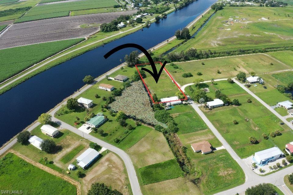 HUGE PRICE REDUCTION Central water, sewer, and electric already available! An incredible investment opportunity in Moore Haven with 5 build-ready lots located just a few yards from access to the Caloosachatchee. Located in a super peaceful neighborhood, these properties offer breathtaking sunrise and sunset views, plus a pond in the back filled with fish, the perfect setting for future homes or a private getaway at the end of a road.

You can build up to 5 single-family homes or join them together and build your dream home on one big parcel, almost 0.70 acres. Don't let this amazing opportunity slip away!

Addresses: 932, 936 (can be split in two), 938, and 940 Meyerchick Dr Moore Haven, FL 33471