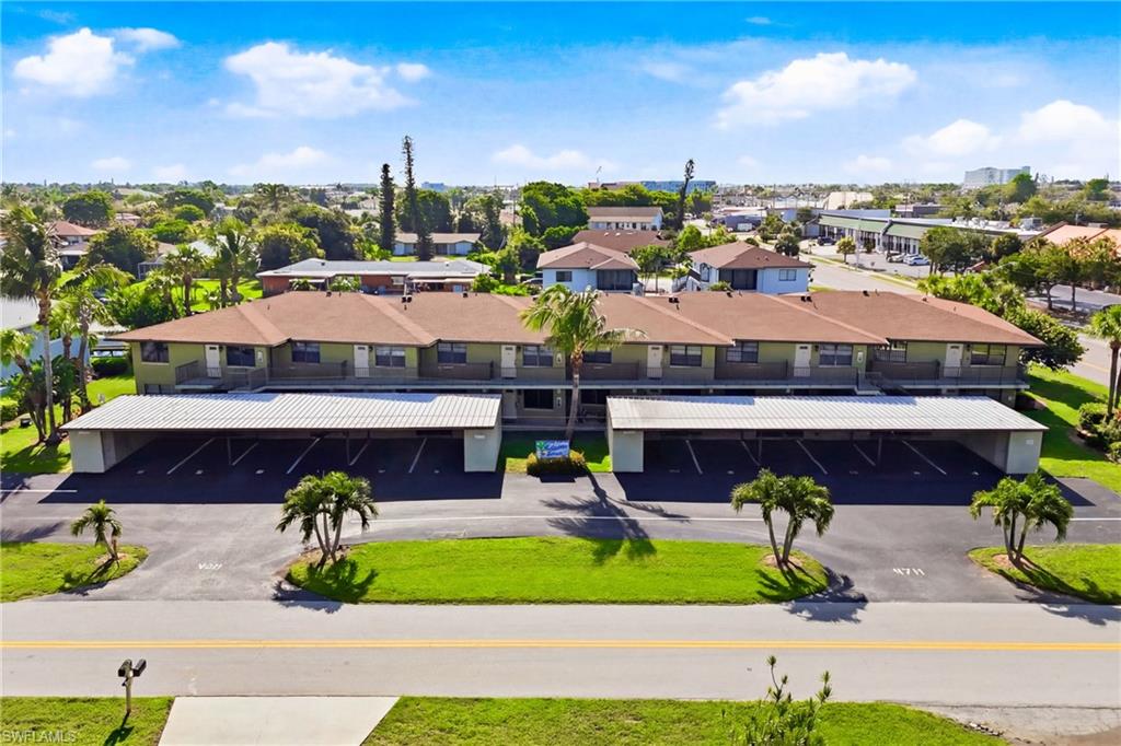 WATERFRONT PARADISE – PRICED TO SELL! Experience the ultimate Southwest Florida lifestyle from this beautifully maintained 2-bedroom, 2-bath, partially furnished second-floor condominium overlooking the breathtaking wide waters of the prestigious Rubicon Canal. Wake up to spectacular sunrises, watch boats glide by, and enjoy the peaceful beauty that only waterfront living can provide. Perfectly positioned on one of Cape Coral's most desirable Gulf-access waterways, this residence offers an incredible opportunity to embrace the boating lifestyle. Cruise to Sanibel Island, Fort Myers Beach, Captiva, Cayo Costa, and countless waterfront restaurants while enjoying everything Southwest Florida's waterways have to offer. Inside, the bright, open floor plan features light tile flooring throughout the main living areas, creating a fresh coastal ambiance. The thoughtfully designed split-bedroom layout provides privacy for both owners and guests, while the partially furnished interior allows you to settle in with ease. Step outside and enjoy resort-style amenities including fishing from the seawall, a sparkling community pool, BBQ area, and stunning wide-water views of the Rubicon Canal. Best of all, you're within walking distance of Cape Coral's popular restaurants, boutique shopping, entertainment, and the revitalized Yacht Club area. Whether you're looking for a year-round residence, a seasonal retreat, or an investment opportunity, this exceptional waterfront condo is priced to sell and offers incredible value in one of Cape Coral's most desirable waterfront locations. Don't miss your chance to own your slice of paradise—schedule your private showing today!