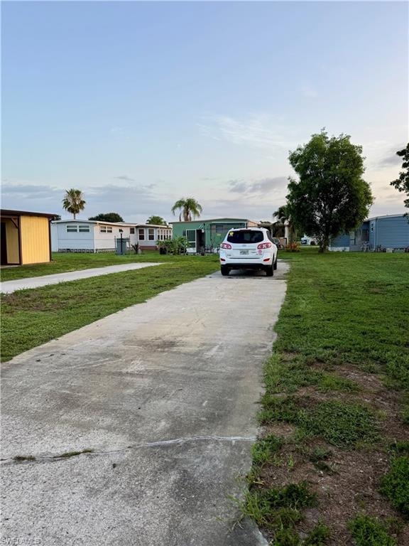 Build Your New Florida Home in Beautiful Poinsettia Park! This is a rare opportunity to purchase one of the last available homesites in Poinsettia Park, a highly desirable gated 55+ community in Fort Myers. Bring your own manufactured home or choose from a variety of new floor plans available through reputable builders and create the Florida home you've always wanted.
Poinsettia Park offers the perfect combination of affordability, convenience, and an active Southwest Florida lifestyle. Residents enjoy a heated swimming pool, waterfront tiki hut, clubhouse with year-round social events and activities, pickleball, bocce, shuffleboard, card groups, billiards, and a welcoming neighborhood atmosphere.
The monthly community fee includes lawn maintenance, high-speed internet, cable television, trash collection, and the security of a gated entrance, allowing you to spend more time enjoying everything Southwest Florida has to offer.
Ideally located just minutes from downtown Fort Myers, I-75, RSW International Airport, shopping, restaurants, medical facilities, golf courses, and the white-sand beaches of the Gulf Coast, you'll have convenient access to everything that makes this area one of Florida's most desirable places to live.
Whether you're searching for a full-time residence, seasonal getaway, or retirement home, this homesite offers an outstanding opportunity to build exactly what you want in an established community where vacant lots are seldom available.
Don't miss your chance to own a share in this sought-after community and build your dream home in sunny Southwest Florida. Opportunities like this are becoming increasingly hard to find!Ask listing agent about available new manufactured home floor plans and turnkey home packages that can be placed on this homesite.