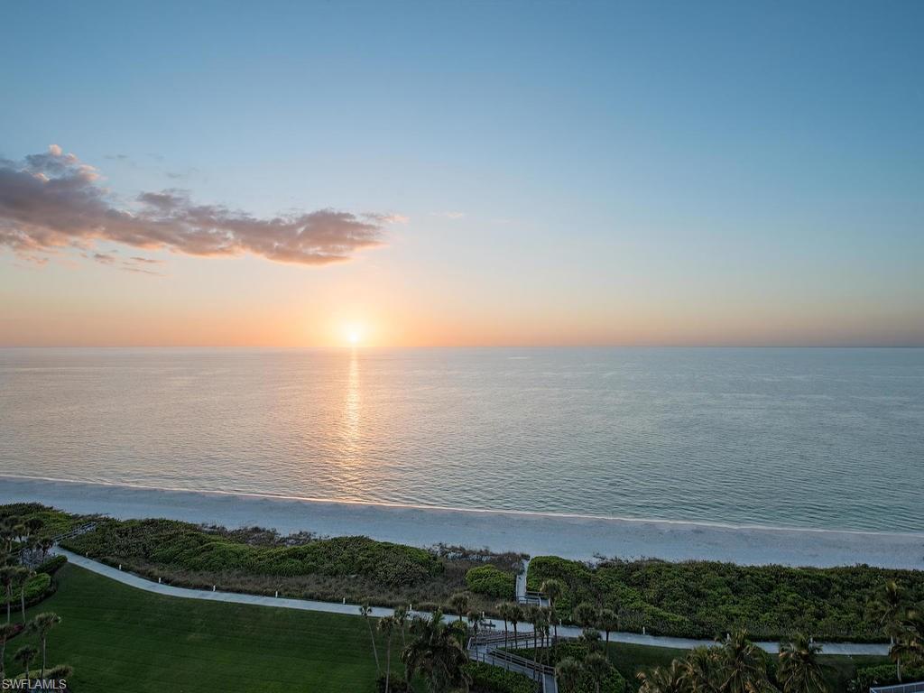C.13536 The 04 stack in Meridian Club offers one of the most breathtaking views of the Gulf of Mexico & Venetian Bay, is highly sought after & rarely available.  With 80’ of continuous open-air balcony this Southwest facing corner location offers sweeping Gulf views by day & twinkling city lights by night over Moorings Bay. This 2 bedroom + Den/3 bath residence features a wonderfully spacious floor plan with lanai access from every room. Floor to ceiling Pella Hurricane glass gives you sunrises to sunsets all year.  Situated in the beautiful garden environment of Park Shore you are treated to direct access to Naples' white sand beaches and the mile long boardwalk which traverses the entire length of the development. The Meridian Club is a non-atrium building w/only 4 units per floor and is one of the most private boutique environments directly on the beach. Tennis courts, Fitness Center and newly updated Pool/Beach side Gazebo with grills, Jacuzzi and saunas.  Gated with 24 hour security brings peace of mind. Don't miss this opportunity to experience why Meridian Club is singularly unique!