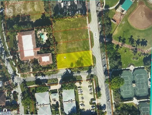 Welcome to your future dream home site. Ideally located less than a one block walk from the fabulous 5th Ave South with its abundance of world class shopping, dining and entertainment. If the beach is your thing this lot is located a short 6 block walk or bike ride away. Enjoy the beautiful view of Cambier Park with access to tennis and so much more. The adjacent lot to the north is also available at $3.2 Mil. if your goal is to build that grand estate home. Take advantage of this ideal location to carve out your little slice paradise now!