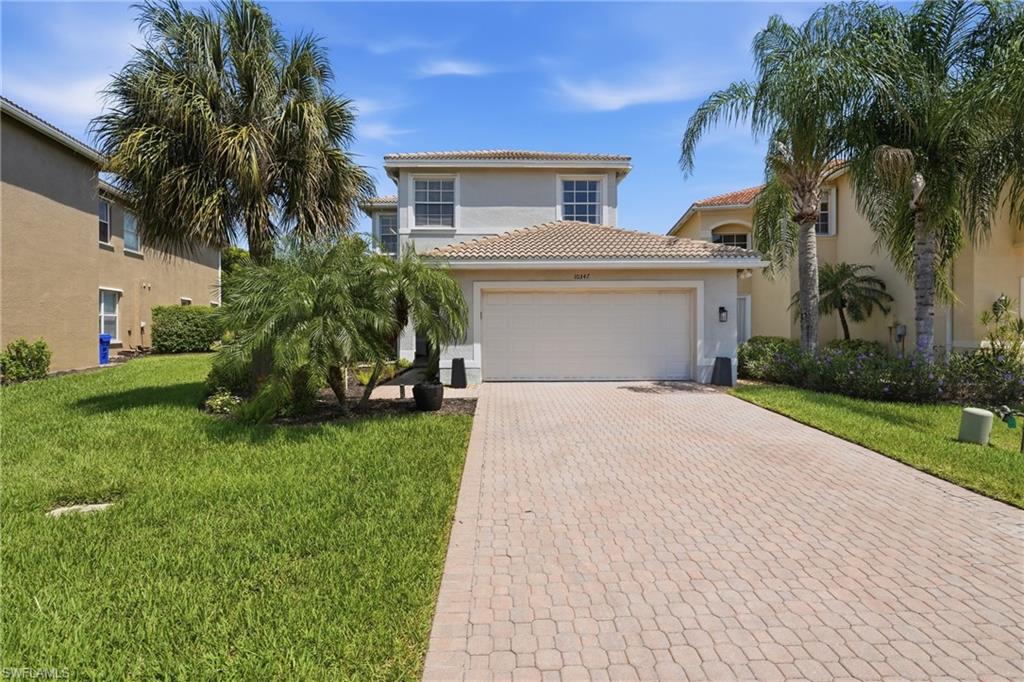 MOTIVATED SELLER- Will consider all reasonable offers!  Welcome to this beautifully updated Sunflower model in the highly desirable Botanica Lakes community. Situated on an oversized lot with stunning lake views and spectacular sunsets, this spacious 4-bedroom, 2.5-bath pool home offers the perfect combination of luxury, comfort, and peace of mind. The property has been meticulously maintained with extensive recent upgrades. The backyard is a private oasis featuring a brand new panoramic screen enclosure that showcases the breathtaking water views, along with a saltwater pool complete with a new heater, pump, and filter—perfect for year-round enjoyment. Inside, you'll find a bright, open-concept floor plan enhanced by fresh interior paint, elegant crown molding, diagonal tile flooring, a beautiful wrought-iron and wood staircase, and dimmable lighting throughout. The chef's kitchen is designed for both entertaining and everyday living, offering abundant cabinetry, generous pantry storage, extended countertops, a wet bar, and KitchenAid stainless steel appliances. The spacious primary suite overlooks the pool and lake, creating a peaceful retreat. It features two custom walk-in closets and a luxurious en-suite bath with dual vanities, a Roman soaking tub, and a separate shower. Additional upgrades include 5-ton HVAC system with warranty, professionally cleaned air ducts, new irrigation system and sprinkler heads, water heater, washer and dryer, garage door opener, garbage disposal, and kitchen faucet. The home also offers keyless entry, a Ring doorbell, security alarm, hurricane shutters, and a child safety pool fence for added convenience and security.  Residents of Botanica Lakes enjoy exceptional resort-style amenities, including a 24-hour staffed guard gate, clubhouse, heated pool and spa, splash pad, fitness center, aerobics studio, playground, basketball, tennis and pickleball courts, plus year-round community events. HOA fees include cable, high-speed internet, lawn maintenance, and irrigation. Ideally located near Treeline Elementary School, RSW International Airport, Gulf Coast Town Center, Hertz Arena, spring training stadiums, shopping, dining, and Southwest Florida's beautiful beaches, this exceptional home offers luxury living with outstanding value. Don't miss this rare opportunity to own one of Botanica Lakes' most beautifully updated homes.