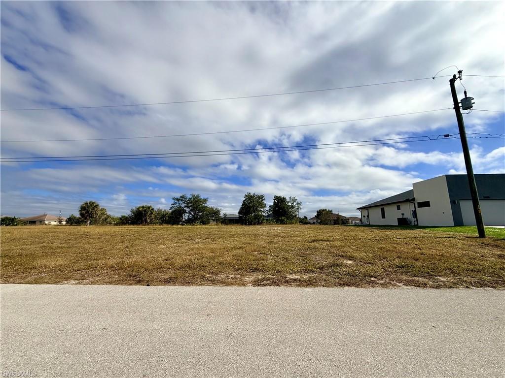 CAPE CORAL CANAL LOT Beautiful lot offers a unique opportunity to build the home of your dreams, this land boasts panoramic views in a convenient location close to local amenities. With ample space to design and build, this lot is perfect for those looking to create their own personal paradise. Don't miss the chance to turn this land into your HOME!!