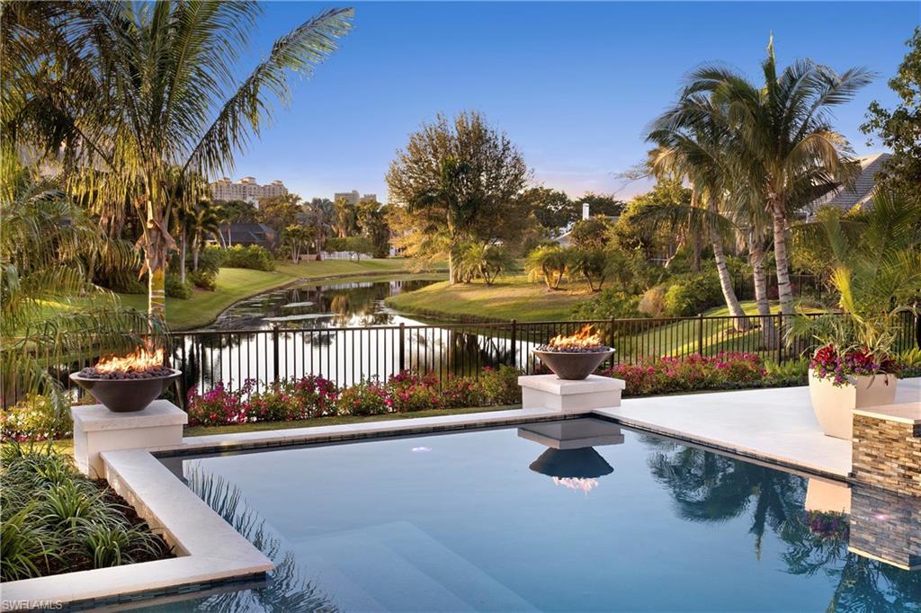 Breathtaking lakefront coastal contemporary estate just completed - there is nothing else like it in Pelican Bay! Designer details astound from the moment you enter the home. Floor-to-ceiling glass windows flood the home with natural light. With wide plank Italian oak floors throughout, the chefs kitchen and butler’s pantry make this home an entertaining dream come true. 5600 ft.², 4 en suite bedrooms, an indoor and an outdoor great room, family room, kitchen, office, butler’s pantry, and 3 car garage all over look a gorgeous long water view. Enjoy every upgrade imaginable. Situated on the cul-de-sac on a quiet street in Pelican Bay, moments from Waterside, Artis Naples, Mercato, and a short walk to the beach. Pelican Bay offers 3 miles of sandy beach, 2 oceanfront beach clubs with dining, cocktails, and beach service; a competitive tennis program; paddle boards, kayaks, fitness center, and the brand new Club Pelican Bay featuring three award winning restaurants, 27 holes of golf, member fitness center and spa.