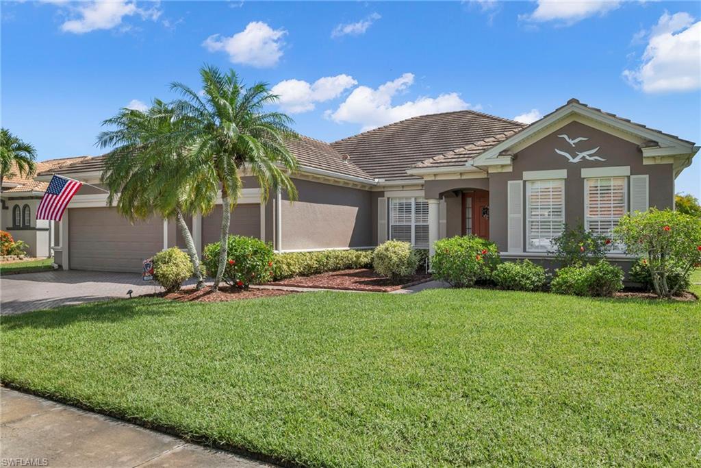 You won't find a larger lanai and pool space anywhere! Welcome to this spacious 4 bed plus den home in Valencia Lakes. This well-appointed family home boasts wide open lake views from the great room and outdoor space. The kitchen is a chef's dream complete with updated luxury appliances, large prep space, island and granite countertops. Upgrades include a new roof in 2020, built-in cabinetry, wood flooring, plantation shutters and a soothing waterfall overlooking the lake. Valencia Lakes is an active community with low fees just minutes from shopping and restaurants. Come and take a look at this beautiful home!