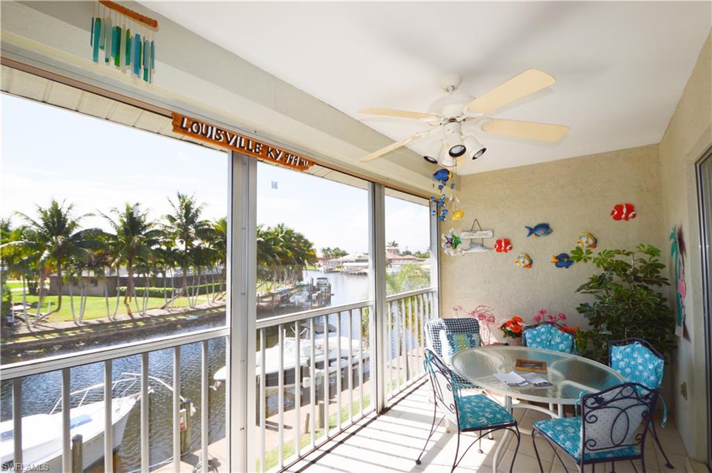 Spacious, 2 bedroom 2 bath, Direct Gulf Access, Waterfront 55+ Community Condo. This unit has over 1,200 sq./ft of living area, an impressive view of the San Carlos canal through new impact windows and hurricane shutters for the screened lanai. Sit on your lanai and enjoy a morning cup of coffee or an evening glass of wine watching boats pass by. Condo is located in a peaceful, well maintained complex, condo has an open floor plan, large bedrooms, huge in-residence laundry room with tons of extra storage, separate exterior locking storage unit, covered carport, large community pool and 1st come boat dock space for owners upon request, currently 2 open docks. Condo is conveniently located near grocery store (Publix), Bimini Basin, The Westin, Rotary Park, Butterly Gardens, RumRunners, Fathomas, Downtown Cape Coral, parks, shopping & award winning restaurants. Don't hesitate, schedule your showing today!
