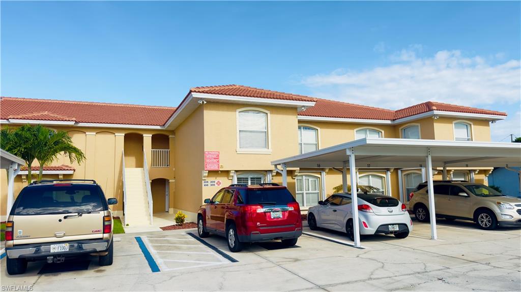 One or more photo(s) has been virtually staged, AI generated or rendered.  Welcome to Belvedere Condominiums in desirable Southwest Cape Coral with monthly mainenace fee of $370. This spacious ground-floor 2-bedroom, 2-bath residence offers 1,170 square feet of comfortable living space with a practical split-bedroom floor plan, ideal for privacy and everyday convenience. The interior features tile and laminate flooring, crown molding, plantation shutters, and a bright living area that opens to a private screened lanai. The kitchen offers solid-surface countertops, stainless steel appliances, and convenient access to the main living and dining areas. Both bedrooms are generously sized, and the primary suite provides a comfortable retreat with its own bath. Additional features include in-unit laundry with washer and dryer, accordion hurricane shutters, a dedicated carport, and a newer roof for added peace of mind. Condominiums offers a community pool and a convenient location close to shopping, dining, Cape Harbour, Tarpon Point Marina, and all that Southwest Cape Coral has to offer. Whether you are looking for a full-time residence, seasonal getaway, or investment opportunity, this well-located condo is a smart option in one of Cape Coral’s most desirable areas.