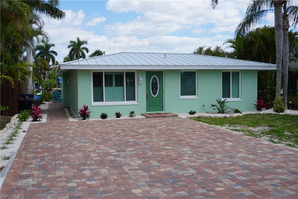 This amazing Matlacha home has everything that you need and more. Beautifully refinished with no oversight on details. Over $160,000 in renovations of the last year! Home boasts new roof, dock, lift, ac,  tiki hut,  impact windows and sliders to name just a few of the may improvements.  The interior has been masterfully redone from the beautiful kitchen, to the new tile and wood flooring. You don't want to miss out on this immaculate turnkey home. It is ready for you to move and and enjoy the island life.