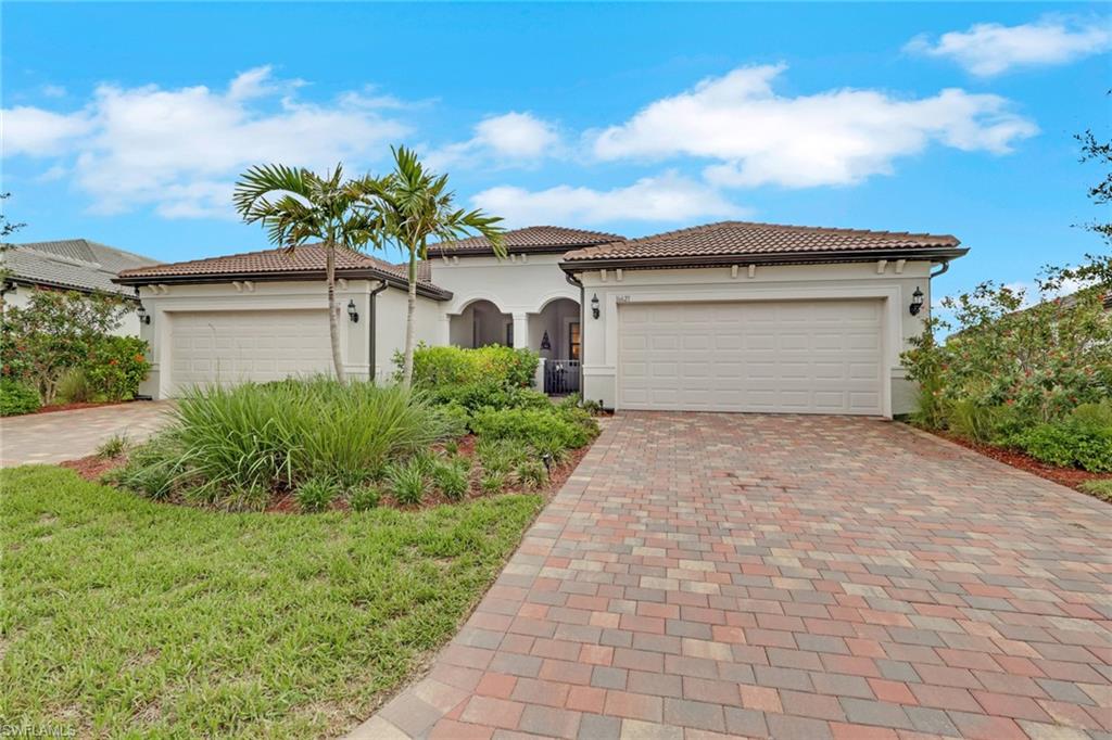 Welcome home to this fully furnished villa in River Hall Country Club. This Ellenwood villa has been ABUNDANTLY upgraded and shows like a model home. The minute you enter the home your eyes will be drawn to all the upgrades. There is crown molding, tile flooring, tray ceiling in owner's suite, remote slider blind and plantation shutters. The kitchen has upgraded stainless steel appliances, upgraded quartz countertops, a stylish backsplash, and soft close cabinets. Designer lighting fixtures and ceiling fans complete the home and tie everything together. The home has also been professionally painted. The private lanai with a northern exposure is situated perfectly on the 18th hole so you can comfortably enjoy the sights and sounds of Southwest Florida while relaxing and watching golf. The time, thought, and expense of the upgrades make this home a steal at $339,900 furnished. The Rolling Rock neighborhood is a highly sought-after neighborhood as it hosts weekly golf, bocce ball and pickleball leagues for Rolling Rockers. Plus, they have an annual golf tournament complete with a pre-tournament team party at the Bunker Bar. River Hall Country Club offers the Members Only Bunker Bar and Caloosa Grill for dining options. River Hall CC members have access to the heated zero entry lagoon style pool at the Bunker Bar that is just a short walk away. The Town Hall Amenity Center is located at the front gate. It has pickleball, bocce ball and tennis sport courts, full fitness center including rooms for yoga, Pilates and private massage rooms. There is also a large resort pool, outdoor play area, billiards, pool side seating and much more. There is a full time activities director always planning new events. River Hall Country Club is an 18-hole Davis Love III designed bundled golf community that is conveniently located between 2 airports and short drive to the eclectic Downtown Ft. Myers River District. Whether you are a snowbird or full-time resident, this maintenance free "move in ready" furnished villa in a fabulous golf community is simply perfect. The golf cart is available for purchase.