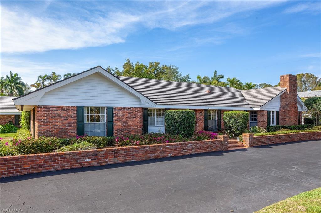 Outstanding opportunity to live in, renovate or build new in this superb location. Just three blocks to the beach and walking distance to Naples Beach Hotel, this home was originally built in 1968 by George Kraft, of Kraft Construction for his own personal residence. Through the years, it has been lovingly cared for and still has a significant presence along the Boulevard today. Situated on almost a half-of-an-acre, with glorious southern exposure, lush tropical gardens, two-car detached garage and generous side yard. Being sold in as-is condition with a right to inspect.