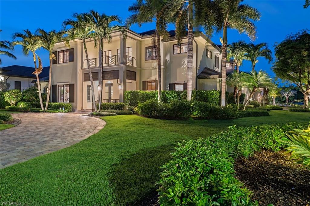 One or more photo(s) has been virtually staged, AI generated or rendered.  Positioned on an oversized corner homesite in the heart of The Moorings, this timeless coastal residence masterfully blends elegant design, exceptional craftsmanship, and effortless luxury living. Offering over 4,200 square feet of beautifully appointed interiors, the home features 4 spacious bedrooms, a private study, and an air-conditioned 3-car garage. Designed for both grand entertaining and everyday comfort, the expansive floor plan is filled with natural light and showcases soaring ceilings, wide-plank oak flooring, custom millwork, and refined architectural details throughout. The chef’s kitchen is a true centerpiece, appointed with custom cabinetry, premium Sub-Zero, Wolf, and Bosch appliances, and a well equipped butler’s pantry. The dramatic two-story great room is anchored by extensive custom built-ins and seamlessly connects to the home’s exceptional outdoor living spaces. A private resort-inspired oasis awaits outdoors, featuring a stunning pool and spa, outdoor kitchen, trellis-covered gathering area, and generous covered living space enhanced by automated screens and storm shutters, creating year-round enjoyment and effortless entertaining. Additional highlights include Control4 home automation, luxurious finishes throughout, and the opportunity for membership to the Moorings Private Beach Park. Ideally located just moments from Naples’ renowned beaches, fine dining, shopping, and cultural attractions, this exceptional residence embodies the very best of the Naples luxury lifestyle.
