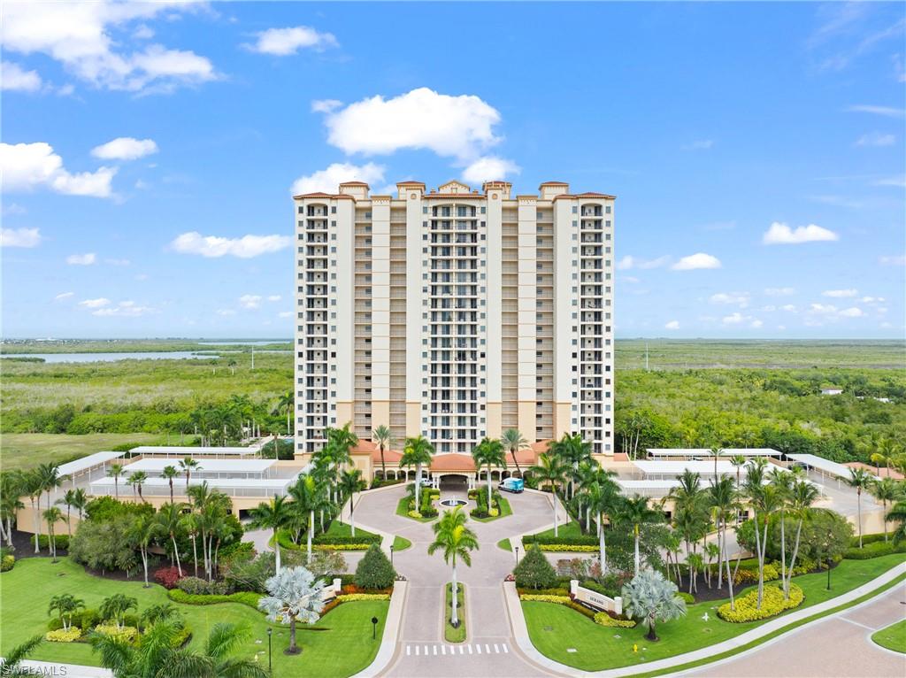 Seasonal furnished retreat in Serano at Hammock Bay Golf & Country Club, ideally set between Naples and Marco Island. This 3-bedroom, 2-bath residence (~1,865 sq ft) sleeps up to six — a king-bedded primary, a queen guest room, and a twin guest room. A screened lanai overlooks tranquil nature preserve: quiet, private, and shaded. Arrive via private secured elevator into your own foyer. Serano delivers resort-style living with a pool and spa, poolside cabanas, fitness center, movie theater, social room with bar and billiards, and outdoor grilling areas — all behind 24-hour gated security. Assigned covered parking included; pets considered with approval. Minutes to Marco Island beaches, the JW Marriott, and a Peter Jacobsen championship golf course, and roughly 20 minutes to 5th Avenue South.