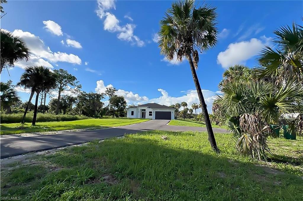 Beautiful furnished single-family home located in a peaceful Naples setting, offering the perfect combination of modern comfort, privacy, and convenience. This spacious residence features 3 bedrooms, 2 bathrooms, a private office/den, and a 2-car garage, situated on a generous 2.5-acre lot. Available for move-in in July. The bright open layout includes high ceilings, large-format tile flooring, a comfortable living area, and a modern kitchen with white and gray shaker cabinetry, quartz-style countertops, stainless steel appliances, subway tile backsplash, and ample storage.

The primary bathroom offers a relaxing spa-like feel with dual vanities, a freestanding soaking tub, and a glass-enclosed shower. Enjoy a quiet natural setting with plenty of outdoor space, ideal for those seeking privacy while still being within convenient driving distance to everyday essentials. Nearby amenities include local shopping plazas, supermarkets, Publix, Walgreens, hardware stores, dining options, and Big Corkscrew Island Regional Park. Naples beaches, restaurants, and entertainment areas are also approximately 30 minutes away, making this a great rental opportunity for comfortable living in a modern Naples home.