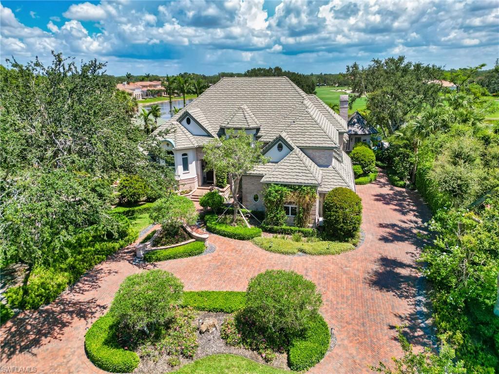One of the premier homes within Fiddlesticks, on a premier lot, is now available for you to make home.  This 4 bedroom/ 5 bathroom home has been completely remodeled in last 24 months exceeding even the most discerning Buyers desires. Temp controlled Wine Room, Butler's pantry, full home theater, complete with all the latest electronics and sound proofing, an elevator and so much more. The primary retreat, on the main level, is spectacular, complete with its own sitting area and views of the 18th hole of the Long Mean golf course. The inside remodel and functionality of the home is only a compliment to the outdoor living space. A Koi pond, meandering along the back of the home, accents the amazing pool and spa. The picturesque view is not encumbered by a cage which would distract from the view of the 18th fairway & green along with the magnificent clubhouse in the distance. The cabana, complete with copper roof, features bar area for entertaining, grilling area and bathroom. These are just a few of the delights one enjoys in your private oasis. Call today to see the one-of-a-kind masterpiece. MANDATORY EQUITY MEMBERSHIP FEE OF $90,000 DUE AT CLOSING. ADDITIONAL MONTHLY FEES APPLY.