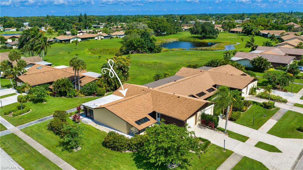 One or more photo(s) has been virtually staged, AI generated or rendered.  Affordable Naples living in an unbeatable location! This beautifully updated 3-bedroom, 2-bath villa offers exceptional value just minutes from Downtown Naples and the area's world-famous beaches. The remodeled kitchen and bathrooms feature stylish tile, updated countertops, and stainless-steel appliances. An oversized garage and air-conditioned lanai provide plenty of space to relax and enjoy the Florida lifestyle year-round. Major improvements include a new roof installed in 2020, offering peace of mind for years to come. Golf enthusiasts will appreciate being just a short walk from Lakewood Country Club, a public 18-hole executive course known for its welcoming atmosphere and outstanding service. Ideally located near Downtown Naples, you'll enjoy easy access to upscale shopping, fine dining, art galleries, and pristine white-sand beaches. Nearby attractions include the Naples Botanical Garden, Sugden Regional Park, local breweries, wine bars, coffee shops, and live entertainment. Whether you're looking for a full-time residence, seasonal getaway, or investment opportunity, this villa delivers the perfect blend of affordability, convenience, and the Naples lifestyle.