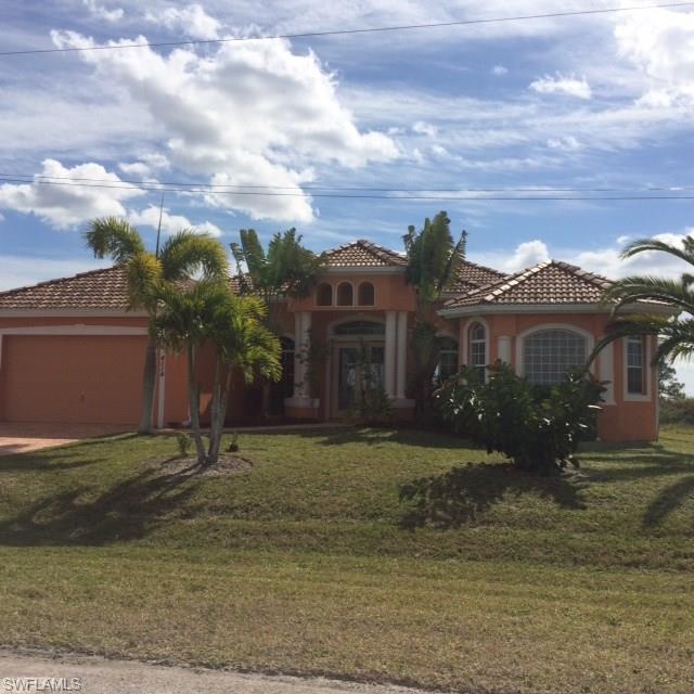 PRICE REDUCED! Stunning and spacious gulf access pool & spa home! Open floor plan with light & bright kitchen , nice bar and breakfast area with the water view. Master bedroom with luxurious bathroom has access to the beautiful pool & spa lanai. Den with French doors, tile roof, paved driveway, garage with extra storage area, laundry room with cabinets and a tub, security system, prewired sound system, .....and much more!  This exquisite property is located just a short walk to a nature park where you can relax and enjoy the Florida wildlife.