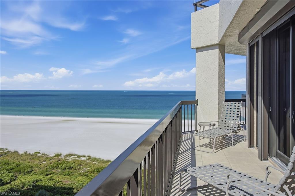 Experience luxury beachfront living from this stunning penthouse residence in the prestigious Princess Del Mar. A full Rookery golf membership is available. Ideally next door to Marco Island Residents’ Beach, this beautifully maintained two-bedroom, two-bath condominium offers sweeping panoramic views of the Gulf of Mexico, Marco Island’s sugar-sand beaches and the sparkling island skyline. Encompassing approximately 1,900 square feet of open, light-filled living space, the residence is thoughtfully designed to maximize the breathtaking coastal setting. Designed for seamless indoor-outdoor living, each room enjoys direct access to a private balcony, creating the perfect setting to take in mesmerizing sunsets over the Gulf and the twinkling island lights in the evening. Offered turnkey furnished, this move-in-ready residence combines elegance and comfort with spacious living areas thoughtfully designed for both relaxing and entertaining. The formal dining area and wet bar flow effortlessly into the expansive living room, where floor-to-ceiling glass showcases the spectacular waterfront backdrop. The custom kitchen is both functional and inviting, featuring a well-designed layout ideal for everyday living and entertaining alike, while the private balcony grill enhances the outdoor dining experience. The spacious primary suite serves as a serene retreat with abundant natural light, three closets and private balcony access overlooking the Gulf. The guest suite also offers its own balcony access, dual closets and an adjacent bath, ensuring guests enjoy the same incredible views and comfort. Additional features include in-unit laundry, a large storage closet and electric storm shutters for added peace of mind. Convenience continues with a private two-car tandem garage connected directly to the building, allowing owners to arrive and access their private island retreat with ease. Princess Del Mar offers an exceptional collection of resort-style amenities, including a beachfront pool and spa, fitness center, tennis, pickleball and shuffleboard courts, library, barbecue grilling area and direct beach access via a private boardwalk. A private guest suite is also available for owners to reserve for visiting family and friends. Ideally near Marco Island’s finest dining, shopping and entertainment, this rare penthouse opportunity combines breathtaking beachfront views, luxurious amenities and the ultimate Southwest Florida lifestyle.