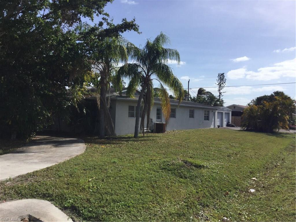 Attention Investors-Oversized Corner Lot. Home has lots of potential to create your dream home. Plus a huge garage that can fit 4-6 vehicles depending on size! Great area, close to Mercato and a short bike ride to the beach! Sold in “As Is” condition.