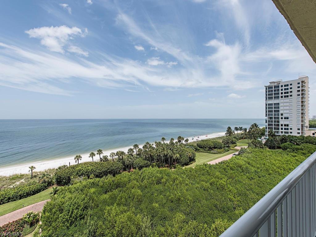 C.13876 - Rarely available NORTH end unit on the SEVENTH FLOOR in Beach House at Naples Cay!  Spectacular views of the Gulf and Clam Bay.  Just steps to the beach!  Floor to ceiling windows in the living room and den.  The original den was extended, enclosing the open lanai, adding interior square footage.  Granite countertops in the kitchen, stainless steel double oven, Thermador cooktop, and new microwave oven.  This upscale beach community is just minutes to fine dining and shopping!  Walk to Venetian Village and Waterside Shops.  Call for your private showing.