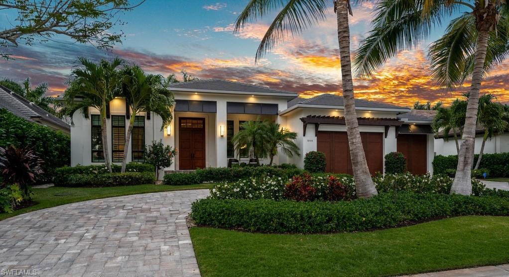 H.15782 - Absolutely move-in condition.  Better than a new construction home.  Absolutely stunning from the minute that you open the front door to the West Indies styled home.  Wide plank hardwood flooring throughout the main areas of home.  Gourmet kitchen with double islands, beverage center, bar, and butler’s pantry. Sub-Zero, Wolf, JENNAIR & kitchen-aid appliances.  Huge great room with stacked stone accent wall, large TV viewing wall, art niches, vaulted ceiling.  Den is accented with large built-ins, street view and coffered ceiling. Owner’s suite is perfectly designed to be flooded with natural lighting.  Spa-like bath area has an extra washer & dryer, built-in linen closets, morning bar and ample storage. Custom Kohler shower system, 6-foot floating tub, 2 custom closets with built-ins all done in coastal colors.  3 large guest suites with en-suite baths and double closets.  Custom folding doors by LaCantina open to the covered lanai space.  The outdoor oasis embodies the Florida lifestyle with a large pool, spa, fire accents, waterfalls, lush landscaping and fenced yard.  Large outdoor summer kitchen is ready for grilling.  Amazing home!!