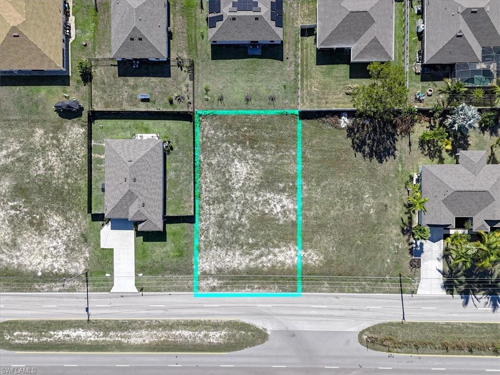 Build your dream home on this 0.23-acre residential lot in the growing and highly desirable Northwest Cape Coral area. Measuring approximately 80 x 125 feet, this cleared homesite is located on a paved road and is zoned for residential construction, providing an excellent opportunity for a primary residence, seasonal home, or investment property. Conveniently situated on Kismet Parkway, this property offers quick access to North Fort Myers, Downtown Fort Myers, Pine Island Road, US-41, Del Prado Boulevard, shopping, restaurants, schools, parks, and everyday conveniences. Its central location allows for easy commuting throughout Cape Coral and the surrounding Southwest Florida communities. Whether you're planning to build now or secure land for the future, this parcel offers the flexibility and location today's buyers are looking for. Cape Coral continues to attract homeowners seeking new construction opportunities, making this lot an appealing option in a rapidly developing area. Buyer is responsible for verifying zoning, building requirements, utility availability, lot dimensions, assessments, environmental conditions, and any applicable development restrictions with the City of Cape Coral and appropriate governmental agencies.