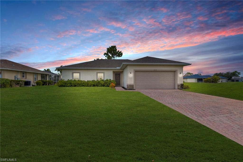 Welcome to Florida living at its finest! This stunning, 2020-built four-bedroom plus office/den, two-bathroom home is situated on a greenbelt lot in the highly sought-after, deed-restricted community of Deep Creek. Offering a spacious multi-split floor plan, modern finishes, and exceptional curb appeal, this move-in-ready home provides the perfect blend of comfort, privacy, and style. Step inside and fall in love with the bright, open-concept layout featuring elegant tile flooring and spacious living and dining areas. The chef-inspired kitchen is designed for everyday living and entertaining, with granite countertops, stainless steel appliances, abundant cabinetry, and a large center island with seating. The private primary suite offers a peaceful retreat with generous walk-in closets and a luxurious en suite bathroom. Three additional bedrooms and one well-appointed bathroom provide plenty of space and privacy for family and guests. Enjoy Florida living year-round from the covered lanai overlooking the expansive backyard, which offers plenty of room to create your dream pool and outdoor oasis. Additional highlights include a two-vehicle garage, paver driveway, irrigation system, indoor laundry room, and beautifully designed exterior. Location is everything, and this home delivers. Enjoy convenient access to Deep Creek Golf Club, parks, boat ramps, shopping, restaurants, Fishermen’s Village, historic downtown Punta Gorda, waterfront dining, and the Sunseeker Resort. Southwest Florida’s beautiful Gulf beaches, Charlotte Harbor, and world-class boating and fishing are also within easy reach. With quick access to I-75, commuting and exploring the surrounding area couldn’t be easier. This is more than a home—it’s the Florida lifestyle you’ve been waiting for. Schedule your private showing today!
