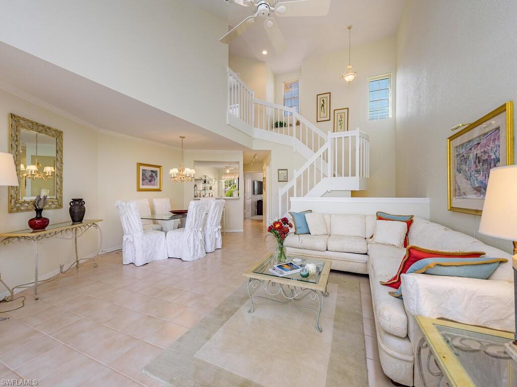 Nestled in the community of Avalon, where effortless coastal living meets the world-class lifestyle of Pelican Bay. This beautifully positioned, 1795 sf, 3+ Den, 2.5 Bath split-level residence offers long lake views and the perfect opportunity to enjoy one of Naples’ most sought-after communities, blending resort-style amenities with unmatched convenience and natural beauty.

Life in Pelican Bay is truly extraordinary. Residents enjoy exclusive access to nearly three miles of pristine private Gulf beaches, complete with tram service through scenic mangrove preserves, beachfront dining, chair and umbrella service, fitness classes, and two private beach clubs, including Marker 36 restaurant. The community also features an exceptional wellness center, an active social calendar, state-of-the-art fitness facilities, and extensive racquet amenities with tennis and pickleball programs for players of every level. Golf Membership opportunities available at Pelican Bay Golf Club, boasting 27 holes of Arthur Hills designed championship golf! 

Beyond the gates, you are moments from the very best of North Naples. Indulge in upscale shopping and dining at Waterside Shops and Mercato, home to luxury boutiques, fine restaurants, entertainment, and vibrant nightlife. Enjoy local favorites like The Turtle Club, La Playa, and world-renown Ritz-Carlton for beachfront dining or explore the countless culinary destinations that make Naples one of Florida’s premier food scenes.
Whether your ideal day includes a morning workout, a friendly pickleball match, lunch overlooking the Gulf, or an evening stroll through world-class shopping and dining, this unit delivers a lifestyle that feels like a permanent vacation. This is more than a home—it is your invitation to experience the very best of Pelican Bay and coastal Naples…. Capture the Naples Lifestyle!