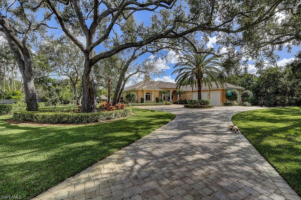 Drive to this property, take one look at the park-like setting, and you will want to live here. This 1.1 acre waterfront estate has 180’ on Whiskey Creek. Absolutely gorgeous with 16 mature live oaks, specimen palms, manicured landscape, decorative fencing, private gate, pavered drive, and the home of your dreams. Features include high ceilings, fireplace, oversized kitchen, exceptional master suite, and a functional office with dedicated exterior door. Plenty of room for all your stuff including 3-car garage with 10’ doors, shed, pantry, walk-in closets, and end-to-end walk-thru attic. Entertaining outdoor living area includes large lanai, custom pool, spa, summer kitchen with separate charcoal and gas grills, full bath, exterior shower, and WOW what a dock area. Get ready to spend time on the water! Enjoy boating, paddle boarding, fishing, or just relaxing by the creek under your tiki hut outfitted with a full wet bar, tv, and cool misting system. Call now for a private viewing.