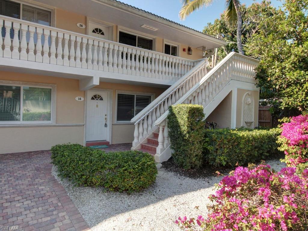 Beautiful updated condo in the heart of Olde Naples, at Castleton Gardens. Walk to 5th Avenue, Saturday’s 3rd Street Farmer’s market, Tin City or Lunch at Naples waterfront Docks. You are in the middle of everything. This two bedroom end unit was just renovated in 2017 and is ready for you furnished, turnkey, all you need is your toothbrush. Professionally remodeled kitchen, a delight for any cook, along with a modern cozy dining area. The unit is tiled through out but the two carpeted bedrooms. Up-dated bathrooms and convenient washer and dryer. Tranquil pool and spa in a beautiful setting in the midst of beautiful garden. Experience Naples from the old Naples seaport for lunch by the water to the Cambier Park for concerts outside.
