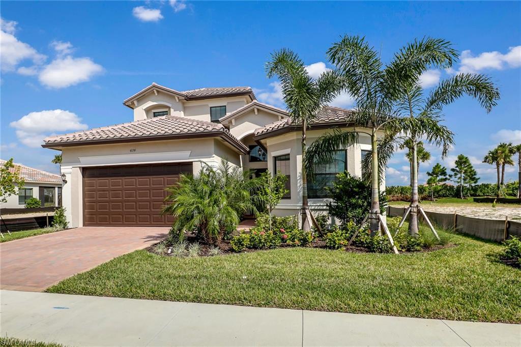 New Construction AVAILABLE NOW. DECORATOR READY / Furnished! Located in Stonecreek by GL Homes, one of Naples Hottest new developments featuring Gas Appliances as standard & zoned for "A" rated schools. An amazing resort-lifestyle included in the community. The 6.25 acre recreation site features a resort-style pool, lap pool, wet play activity center, whirlpool spa, firepit, lake overlook pier and pavilion, outdoor tiki bar with outdoor dining area, 5 clay tennis courts with shade pavilions, 4 pickleball courts, beach volleyball court, full size basketball court, shaded tot lot, a party pavilion & much more. This home is a Chandon Grande floor plan featuring 4 bedrooms and 3 full bathrooms downstairs plus spacious upstairs bonus room with half bath. Upon entering, the long foyer takes you to the heart of the home with an expansive open-plan living area which includes a great room, formal dining, casual dining & gorgeous kitchen. The large master features his & her walk-in closets & a well appointed en suite. The lot has a great view & the "L" shaped rear lanai provides enough space for both outdoor seating & dining. Prices subject to increase without notice.