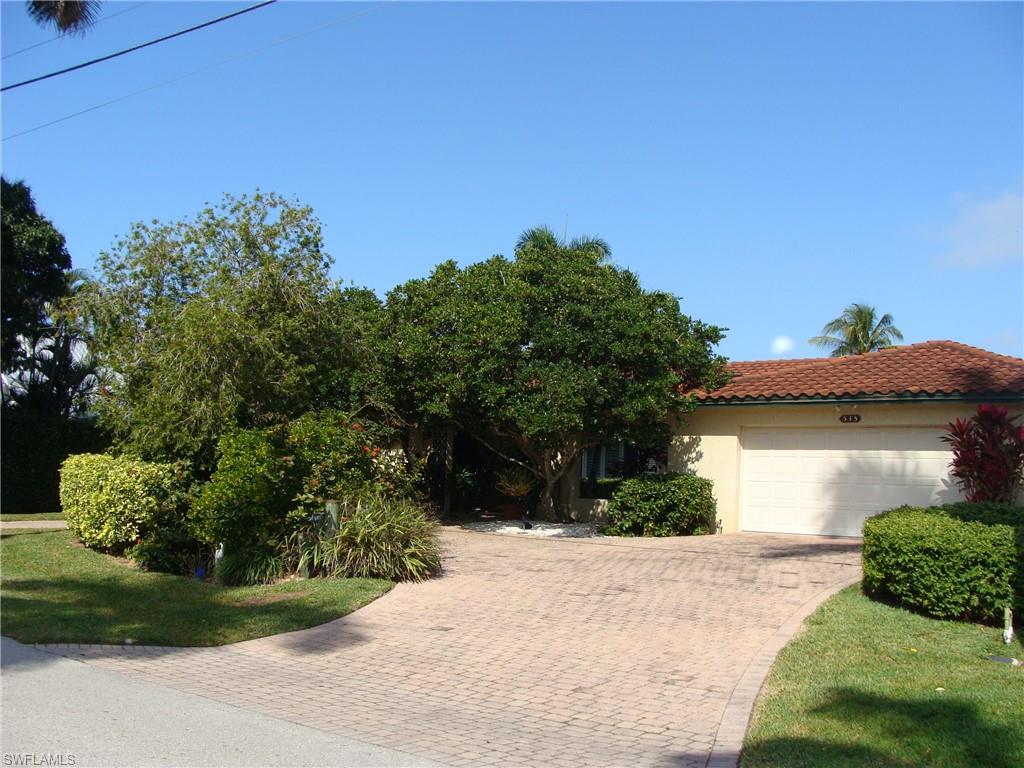 Great home or home site on dead end, royal palm lined avenue. Walk to beach, 3rd St and farmer's market. No bridges to Gulf. Boat dock and boat slip. Nestled amongst new homes. Build your own home or live in this ranch. Extremely well maintained home.