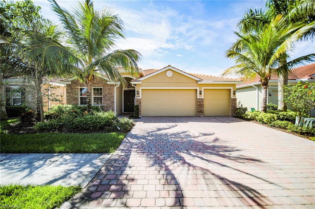 Spacious open concept 4/3 with the 3rd garage right on the lake!