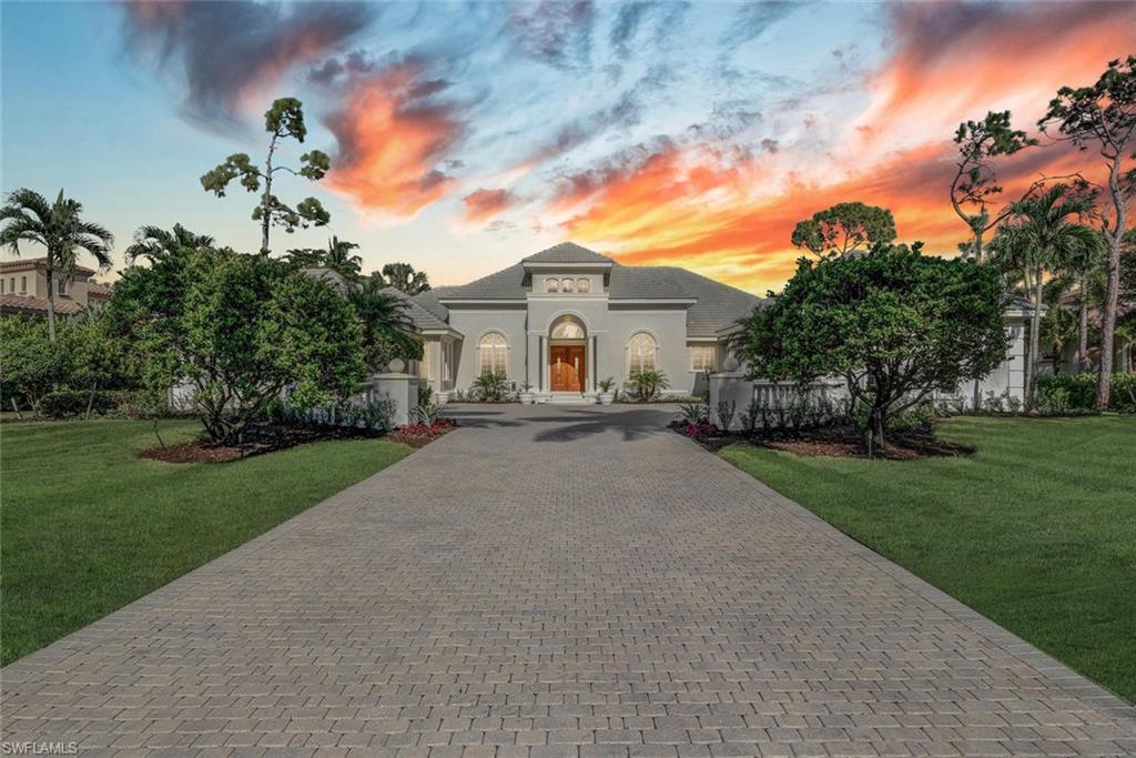 Grey Oaks Estate home on nearly 3/4 acres with sunrise views overlooking the 14th green of the magnificent Pine Course. You'll want to see this spacious home first!  From the moment you enter the foyer you'll be greeted by the dramatic living room with floor-to-ceiling glass.  The great room and kitchen with vaulted ceiling features 90-degree sliding glass doors which frames the view of the expansive under roof lanai with outdoor fireplace for casual Florida living.  Enjoy the pool and spa and outdoor areas for entertaining. Privacy as well as 3 car garage spaces and ready for immediate occupancy! The award-winning Grey Oaks Country Club recently completed a $30 million-plus renovation, including a 30,000 sq. ft. state-of-the-art health and wellness center, five-star lagoon beach style pool and cafe area, indoor and outdoor restaurant and bar, tennis center, Naples only luxury community with 54 holes of championship golf, and state-of-the-art wellness center.  Minutes to Olde Naples, the sugar sand Gulf of Mexico beaches, The Naples Philharmonic, fine dining, entertainment and shopping! Grey Oaks is a debt free community with no CDD. A minimum of sports membership is required.