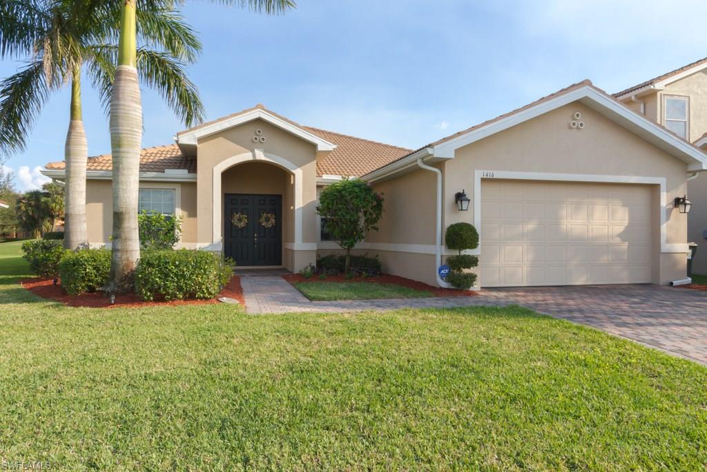 Welcome to Valencia Golf & Country Club, one of the most desired communities in North East Naples. One of the newest in the neighborhood. This split and open floor plan single-story home was built in 2012 and features 2,245 square feet under air, 3 bedrooms plus den, 2 baths, 2 car oversized garage, large laundry room with utility sink, coffered ceilings in master and family room, stainless appliances, granite countertops throughout, premium cabinets, double paned glass, upscale trim work, closet organizers in all bedrooms, tile throughout living areas and carpet in the bedrooms, and much more. Security and comfort features include monitored alarm system, Ring doorbell, Nest thermostat, Nest Protect smoke alarms and landscape lighting. Enjoy the stunning view of the back tee of the 5th hole of the Valencia Golf Course from the 34 foot screened lanai. Valencia is one of the few public golf courses in Naples, has no high equity or bundled fees, just low optional membership fee or pay as you play.The clubhouse features a gorgeous lagoon-style community pool, fitness center, billiards room, and kitchen. This location is in a fast growing area close to schools and a brand new Publix.