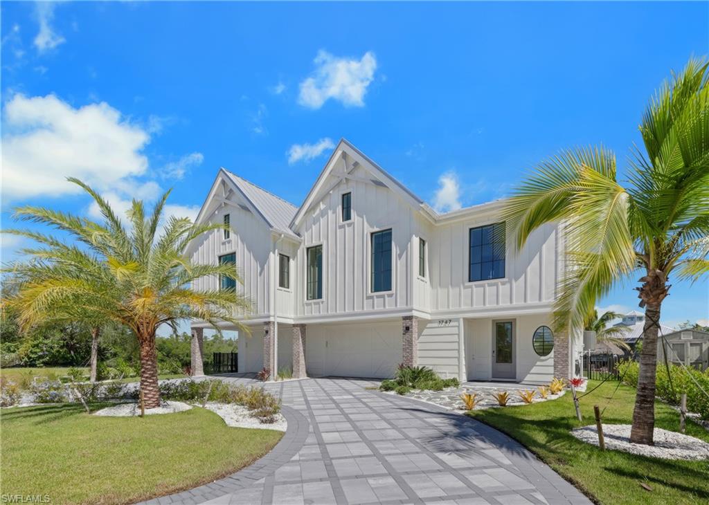 BRAND NEW Waterfront Masterpiece, PRICED TO SELL TODAY! Experience the pinnacle of coastal luxury living in this never-lived-in waterfront estate. Perfectly positioned along a serene canal with direct Gulf access, this HOME showcases unmatched craftsmanship, exceptional design, and meticulous attention to detail throughout every space.  Step inside to soaring ceilings, expansive open living areas, and walls of glass that frame breathtaking water views. The custom chef’s kitchen, refined finishes, and elegant indoor-outdoor flow make this home an entertainer’s dream.  Outdoors, enjoy your private paradise with a 13,000 lb. boat lift, expansive dock, and seamless access to Naples’ world-class waterways… just a few minutes into Naples Bay and all that area has to offer. Whether cruising by boat into the sunset, or to dinner with friends, or even relaxing poolside, this residence celebrates the BEST of waterfront living.  Car enthusiasts, you will be, for sure, captivated by the 6-car garage, designed with precision for collectors or hobbyists who appreciate both form and function.  For car and dining enthusiasts alike, only a short walk to 5th Avenue's world-class dining AND not to forget some of the amazing car shows and other events.  Every element of this HOME has been curated to surpass expectations, a TRUE statement of modern luxury, artistry, and enduring quality.