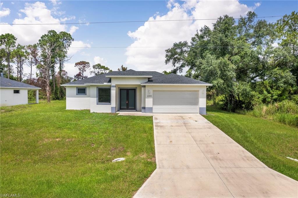 Discover the potential of this home constructed in 2024 in Lehigh Acres, ready for your finishing touches! Situated on a spacious .26-acre lot, this property offers a versatile floor plan featuring 3 bedrooms, a den/home office, 2.5 bathrooms, and a 2-car attached garage.

Designed with modern living in mind, the home provides ample space for family gatherings, entertaining, or working from home. The den offers flexibility for a home office, playroom, or guest space, while the generous lot provides room to create your ideal outdoor living area.

A rear patio adds additional outdoor enjoyment. Whether you're an investor, contractor, or buyer looking to customize a home to your personal style, this property presents a unique opportunity to complete a newer construction home to your specifications.

Conveniently located near shopping, dining, schools, and major roadways, this Lehigh Acres property combines the benefits of newer construction with the chance to add your own finishing touches and make it truly your own.