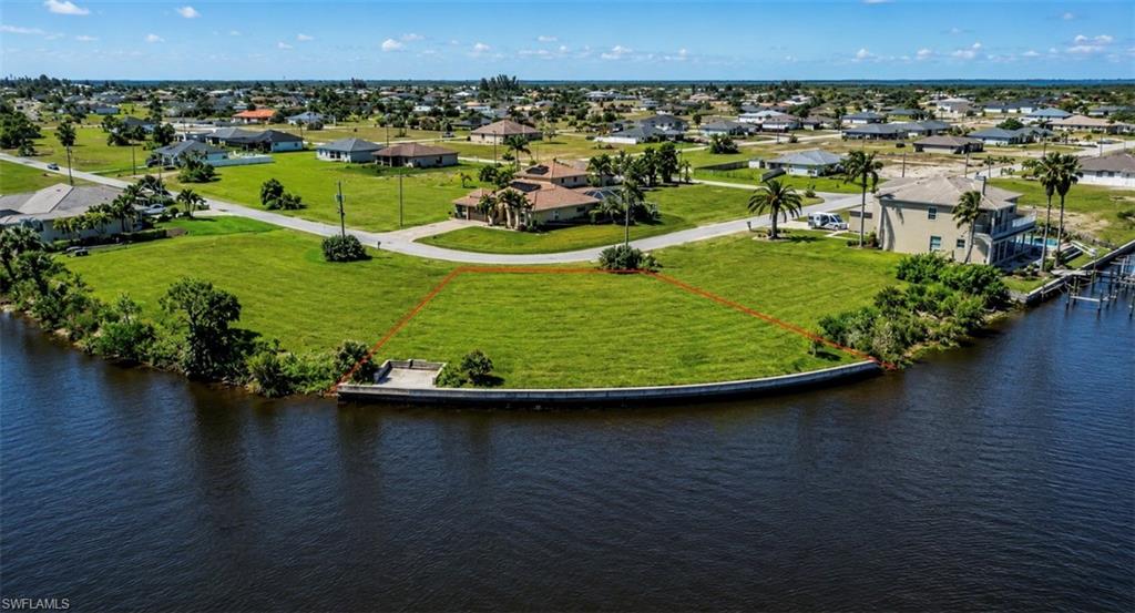 **Build Your Dream Waterfront Estate in Paradise!**

Exceptional opportunity to own an oversized triple-lot homesite with direct sailboat Gulf access on the highly desirable Longview Canal. Boasting an impressive **152 feet of waterfront frontage**, this premium property is already equipped with a **seawall and concrete dock**, providing ample space to accommodate multiple vessels, a large yacht, or your ultimate waterfront lifestyle.

Surrounded by stunning new luxury construction, this rapidly growing area continues to attract discerning buyers seeking the very best of Southwest Florida living. Whether you envision a custom waterfront estate, expansive outdoor entertaining areas, or a private retreat with panoramic water views, the possibilities are truly endless.

Wake up each morning to refreshing Gulf breezes and spend your evenings enjoying spectacular sunsets over the water. From world-class boating and fishing to the unmatched beauty of Southwest Florida's waterfront lifestyle, this property offers more than just land—it offers a rare opportunity to create the home and lifestyle you've always imagined.

**Direct Gulf access. Oversized triple lot. 152 feet of waterfront. Seawall and dock already in place. Your waterfront dream starts here.** ??????